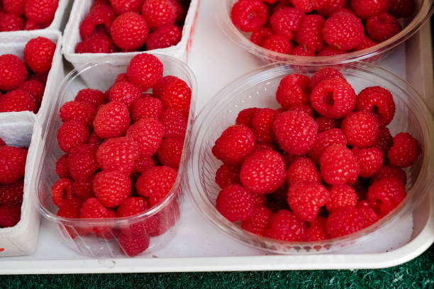 istock Red fruits: heap of raspberries 864615336