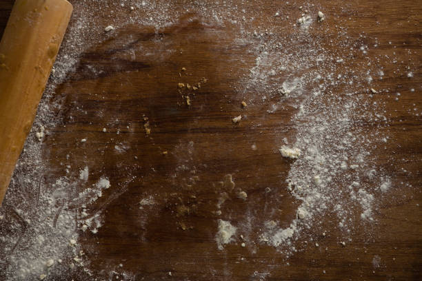 istock Left over flour after flattening dough on a wooden table 864615534