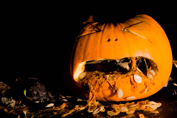 istock A carved pumpkin looks to be vomiting 864615700