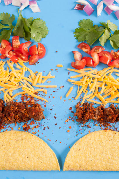 Mexican food crunchy beef tacos, ingredients in a row, knolling.