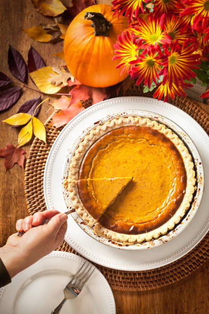 istock Autumn Pumpkin Pie Still Life for Thanksgiving Dinner 864630818