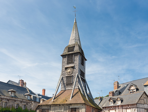 Bell tower of at Saint Catherine's Church in Honfleur, France. The tower is a famous landmark of the old medieval city near the Seine.