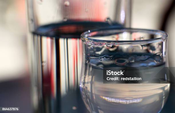 Cold Served Macedonian Rakia And Glass Of Water Stock Photo - Download Image Now - Abuse, Alcohol - Drink, Balkans