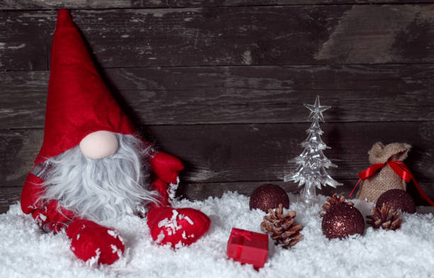 istock Christmas backgrounds, Christmas decoration, Christmas dwarf on snow 864648842