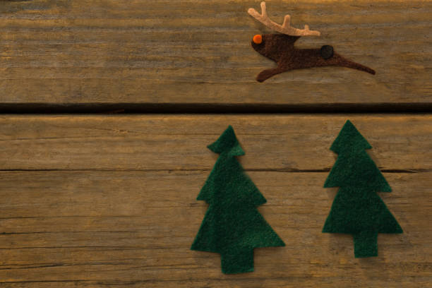 istock Overhead view of Christmas tree and reindeer decoration 864653862