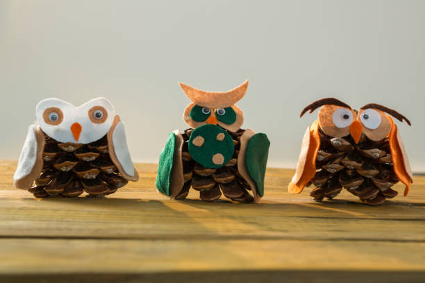 istock Close up of owls made with pine cones 864654196