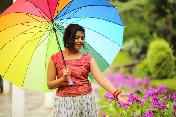 istock Female Touching the Flowers 864654452