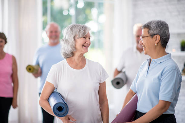 istock Chatting With Yoga Mats 864654542