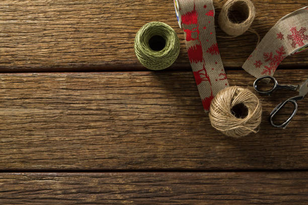 Free Stock Photo of Various threads and decorations on a rustic table ...