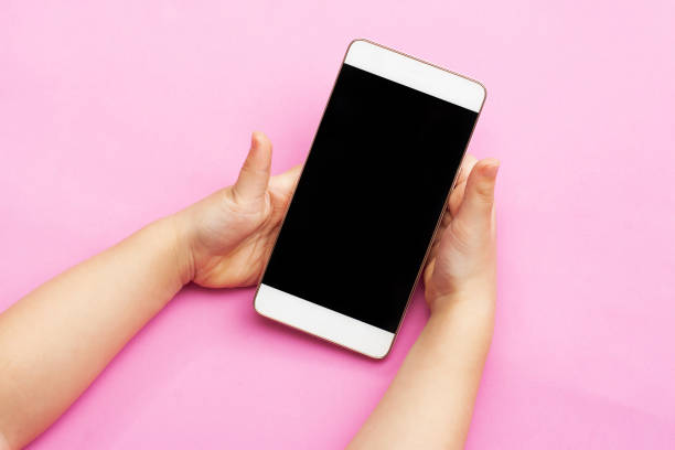 istock smart phone in the hands of a child 864664672