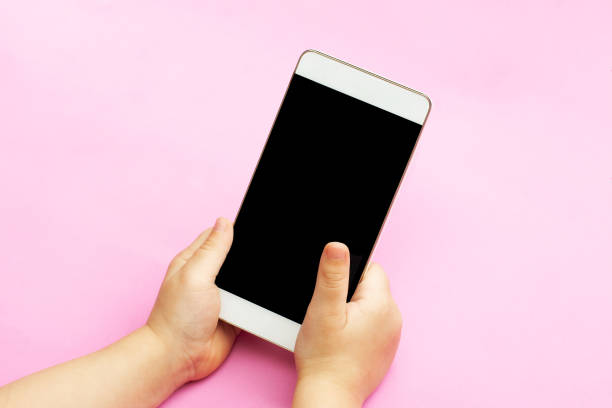 istock smart phone in the hands of a child 864664902