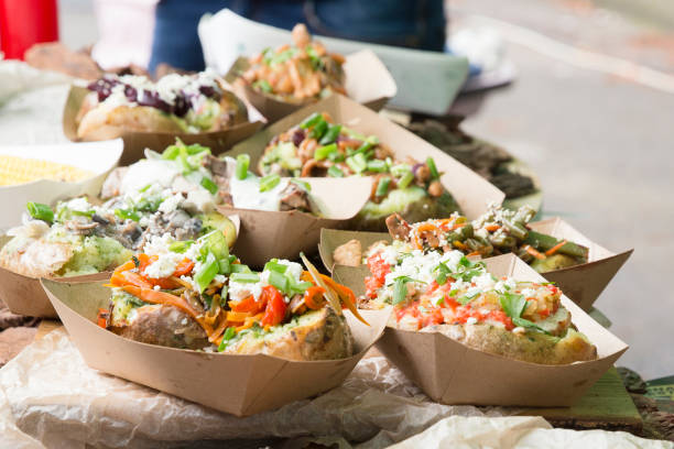 istock Baked potatoes with vegetables. 864665326