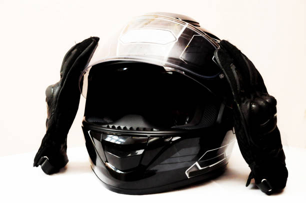 istock Motorcycle Helmet and black protection Leather Gloves 864665498