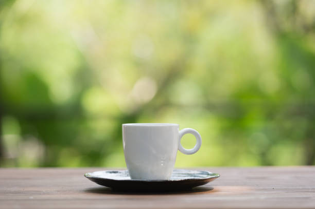 istock Coffee cup on wooden tables 864668114