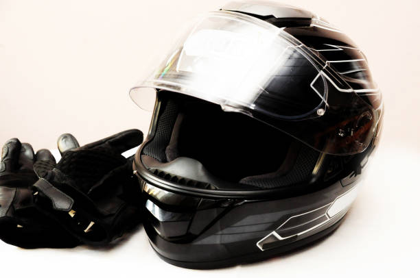 istock Motorcycle Helmet and black protection Leather Gloves 864668132