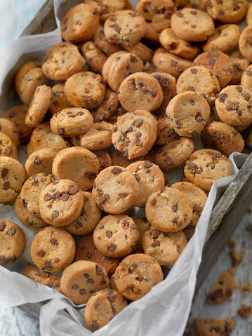 Some american cookies on an oven rack with white copy space