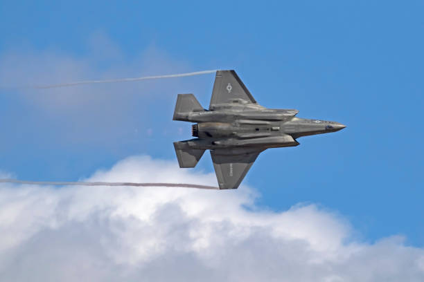 San Diego, California, USA - September 23,2017. F-35 Lightning stealth jet fighter flying a high speed banking turn at the 2017 Airshow in San Diego, California. The 2017 Miramar Airshow features aircraft flying and performing free to the general public.