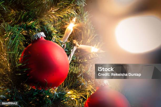 A Closeup Of A Red Christmas Ornament Stock Photo - Download Image Now - Christmas Ornament, Christmas Tree, Red
