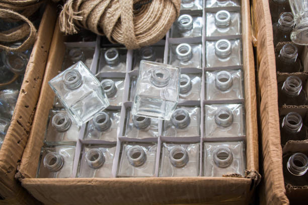 istock Set of Empty little transparent bottles in a box 864701536
