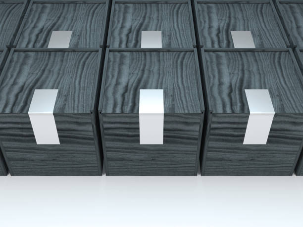 istock Black Square wooden boxes with silver stickers on white 864707304