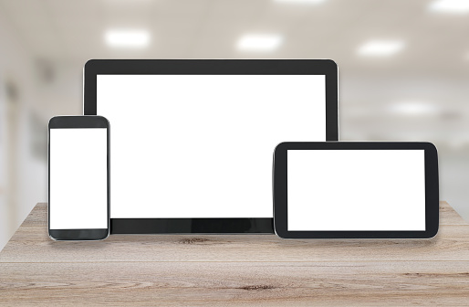 Concept of multi device technology mockup for responsive design presentation - digital tablet and smartphone in various orientation.