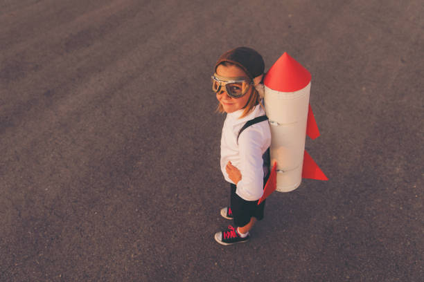 istock Young Business Girl with Rocket Pack 864707834