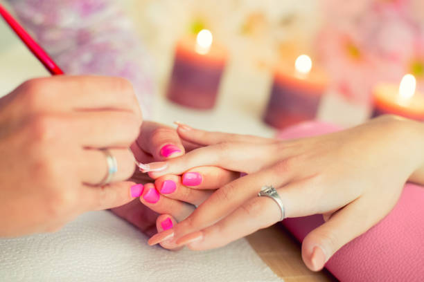 istock Manicure process in a beauty salon 864708090