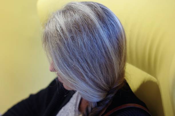 istock Woman reading a magazine 864708864