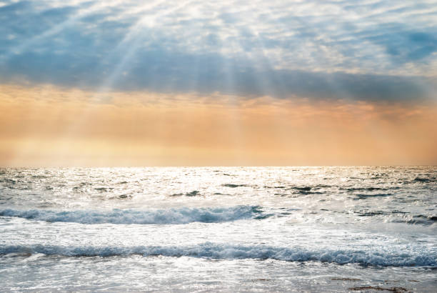 istock Sunset on the blue sea with waves 864713224