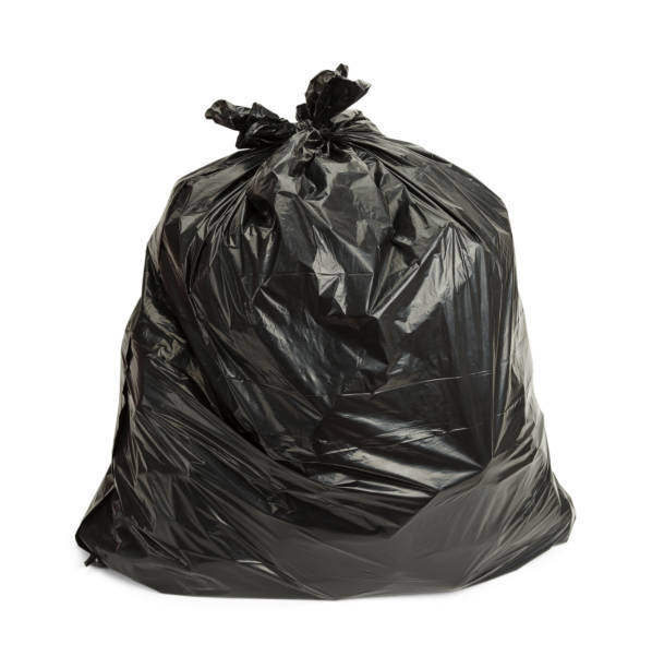 Black Trash Bag Full Garbage Bag Isolated on White Background. garbage bag stock pictures, royalty-free photos & images