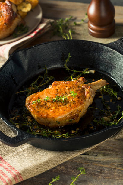 istock Homemade Roasted Bone in Pork Chop 864721456