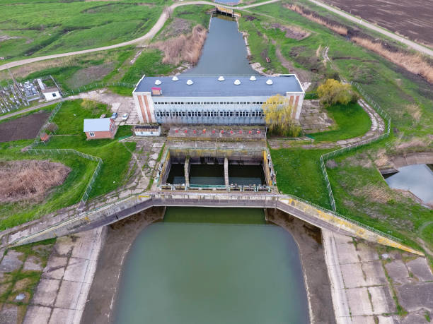 istock Water pumping station of irrigation system of rice fields. View 864735606