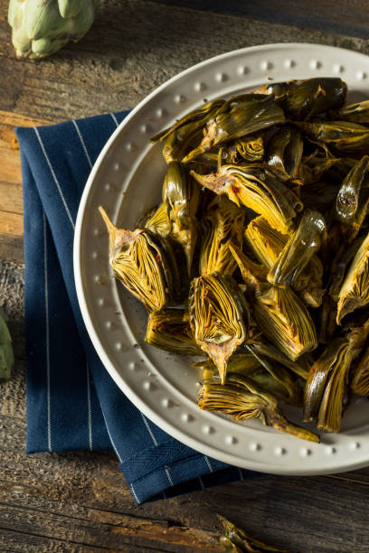 istock Roasted Organic Baby Artichokes 864739580