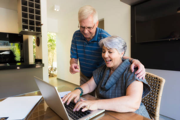 istock Senior couple making good plans 864742458
