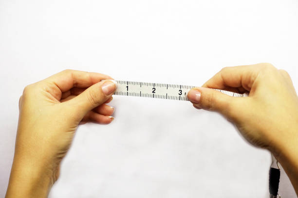 istock tape measure in hand 864746216