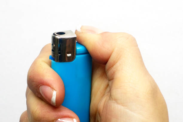 istock the cigarette lighter in my hand 864752424
