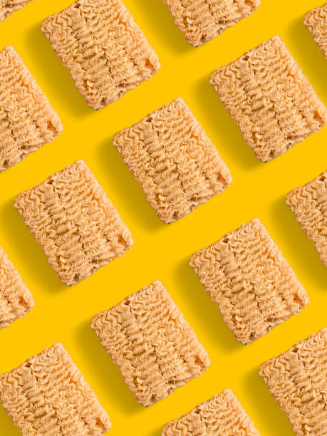 istock instant noodles composition on yellow 864753816