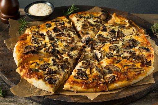 Gourmet Homemade Mushroom Pizza with Thyme and Rosemary
