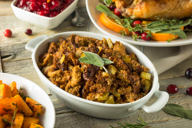 Homemade Organic Thanksgiving Stuffing Homemade Organic Thanksgiving Stuffing with Sage Herbs stuffed photos stock pictures, royalty-free photos & images