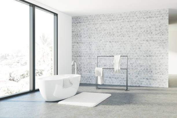 istock Concrete bathroom, white tub, loft 864775186