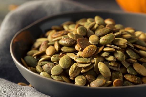 istock Organic Spicy Homemade Pumpkin Seeds 864777576