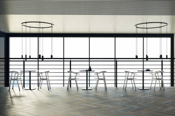 istock Loft cafe black tables, white chairs 864777840