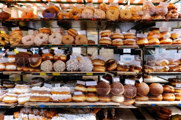 istock Rows of doughnuts on a market stall 864802214
