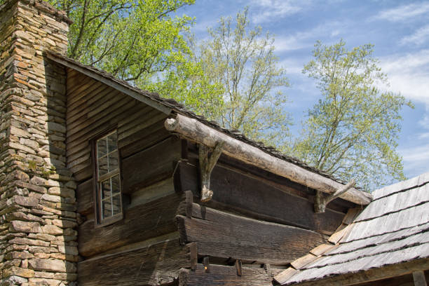 istock Old cabin with rock chimney 864804458