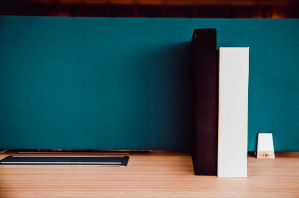istock black and white book on working desk 864804764