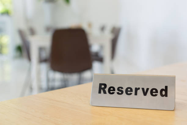 istock Reserved sign on wood table in restaurant 864809180