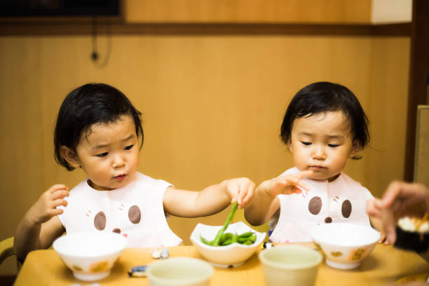 istock Cute baby with a meal 864817706