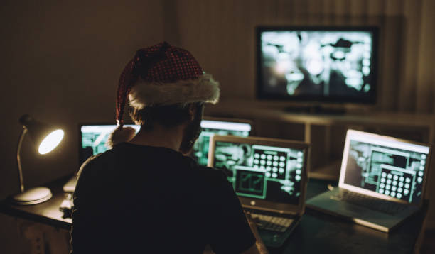 crime de natal - computer hacker identity security stealing - fotografias e filmes do acervo