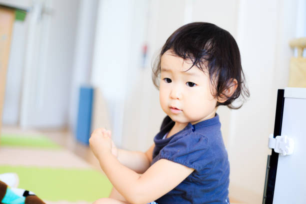 istock Cute child playing indoors 864818278