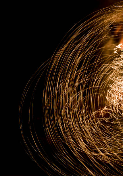 istock Abstract Image Of Yellow Light Trails At NightAbstract lines on black. 864835036